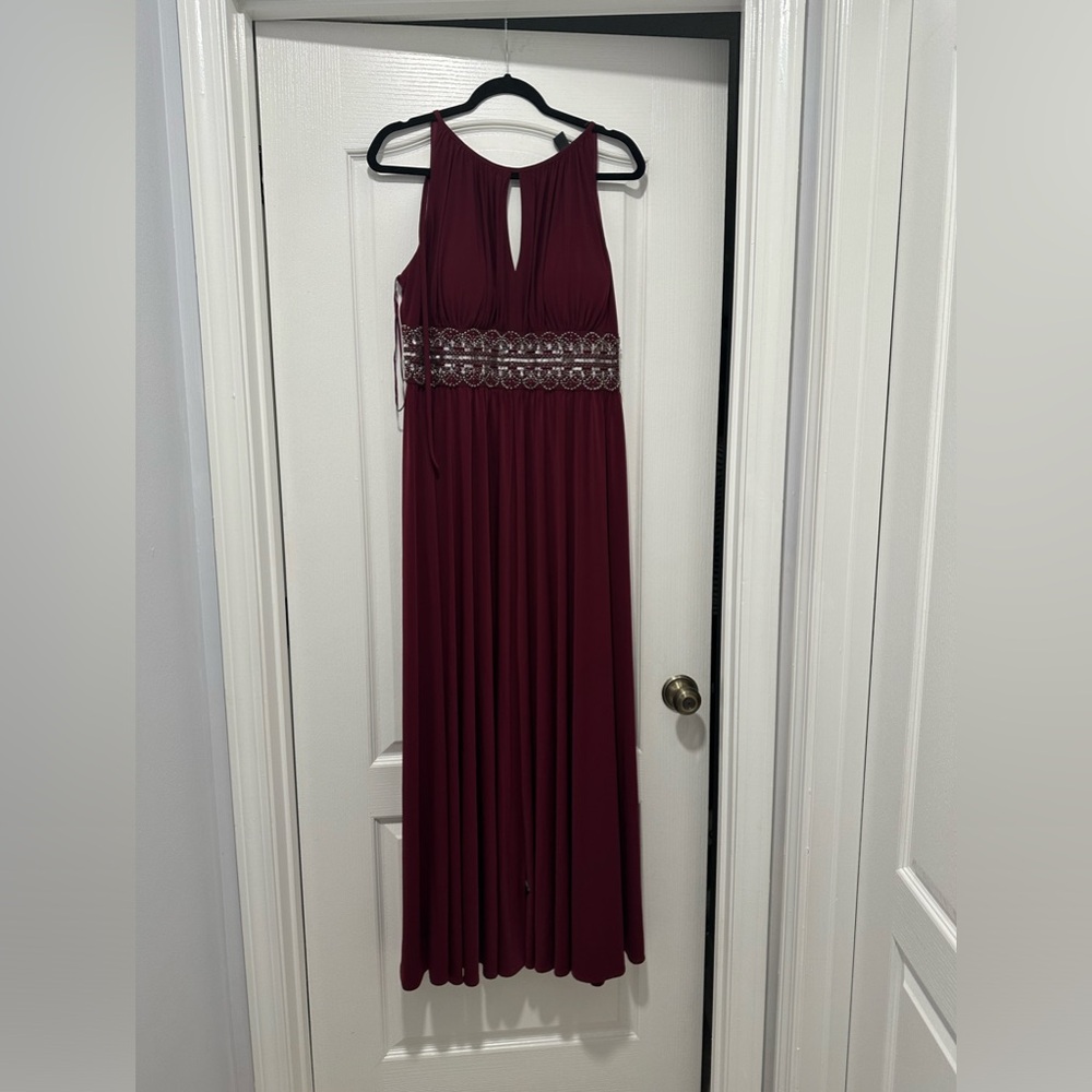 R.N Collection 
New With Tags 
Merlot colored Long dress
Size 16